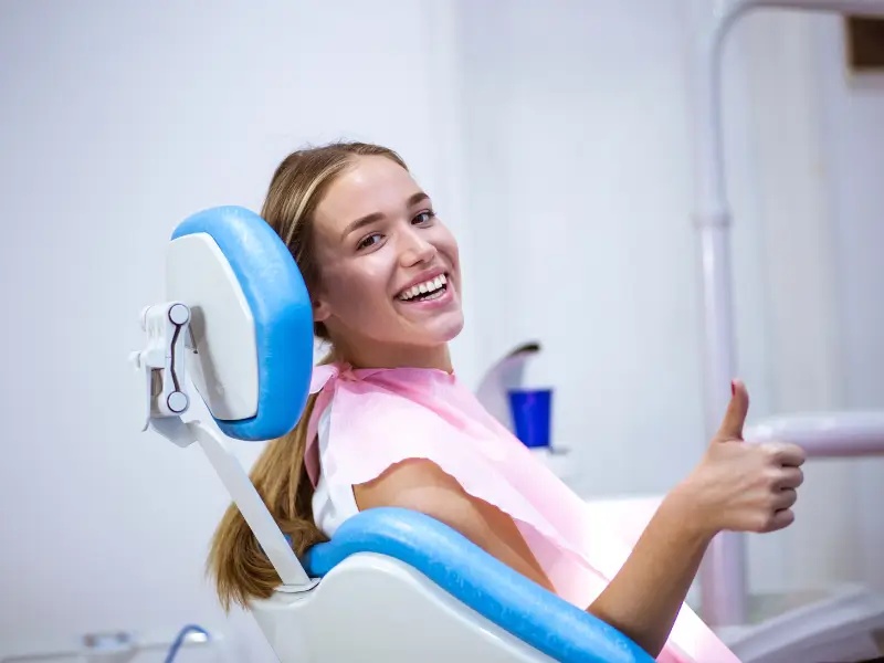 A happy patient in the dental chair
